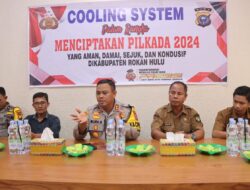 WUJUDKAN PILKADA SEJUK, KAPOLRES ROHUL COOLING SYSTEM DENGAN KEPALA DESA DAN PERANGKAT DESA RAMBAH TENGAH UTARA