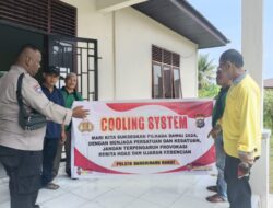 Polsek Bangkinang Barat Ajak Warga Desa Merangin Sukseskan Pilkada Damai