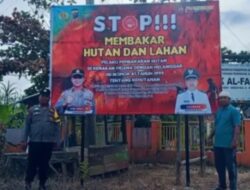 Polsek Rambah Hilir Pasang Baliho Cegah Karhutla, Pembakar Hutan Terancam 15 Tahun Penjara & Denda