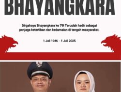 Kepdes Teluk Aur Muslim SH, Bersama Ketua TP, PKK Mengucapakan Selamat Hari  Bhayangkara Ke-79 Tahun 2025.