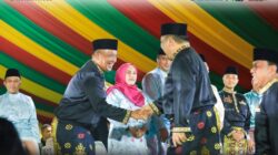 Serasi Berbusana Bercorakkan Melayu Emas, Bupati Anton Bawa Semangat Rohul Siap Sukseskan Tuan Rumah MTQ Riau ke-45