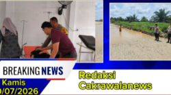 Polsek Bonai Darussalam Evakuasi Dua Korban Mobil yang Terjebak Banjir di Sontang