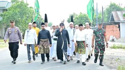 Polsek Kepenuhan Amankan Pawai Semarak Milad Ke-4 Pondok Pesantren Basma Darul ’Ilmi Wassa’adah