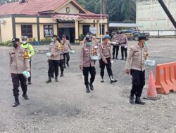 Polsek Tambusai Utara, Peduli Kesehatan di Tengah Kabut Bagikan Ribuan Masker kepada Pengguna Jalan